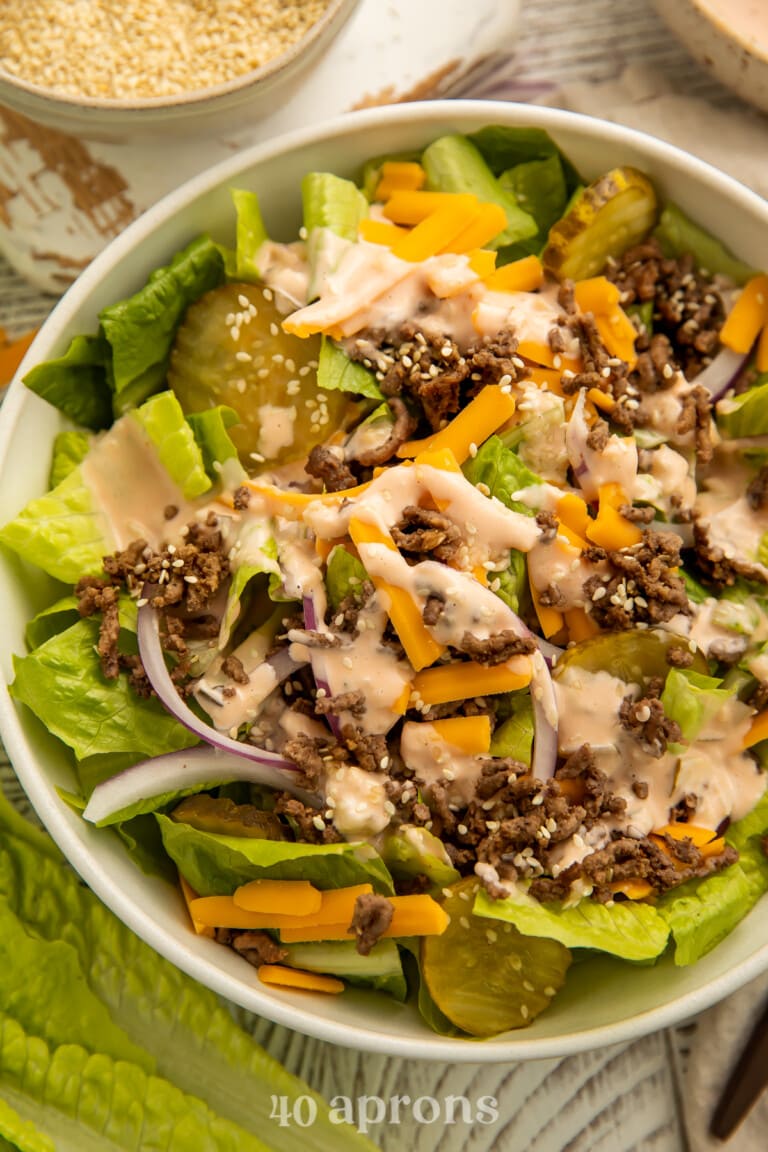 Overhead view of a keto big mac salad in a bowl